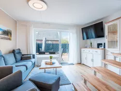 Bild zur gratis inserierten Ferienwohnung Modernes Ferienhaus in Carolinensiel mit Garten, Grill und Terrasse - 4 DTV-Ste.