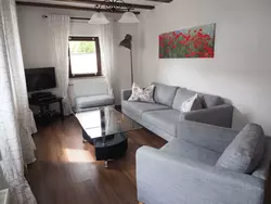 Bild zur gratis inserierten Ferienwohnung Hochwertige Ferienwohnung mit Terrasse und Garten.