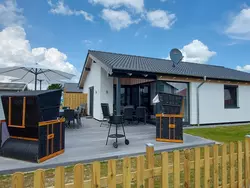 Bild zur gratis inserierten Ferienwohnung G5 Ferienhaus mit Garten in Eckwarderhörne.