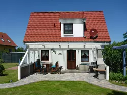 Bild zur gratis inserierten Ferienwohnung Behagliches Ferienhaus mit Garten und Terrasse.