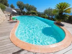 Bild zur gratis inserierten Ferienwohnung Wohnung mit Terrasse, Gemeinschaftspool und Aussicht.