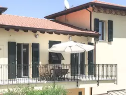 Bild zur gratis inserierten Ferienwohnung Penthouse mit Garten und privater Terrasse in Villa.