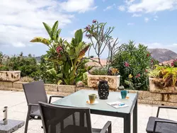 Bild zur gratis inserierten Ferienwohnung Wohnung mit botanischem Garten und Meerblick.