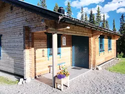 Bild zur gratis inserierten Ferienwohnung Charmantes modernes Blockhaus mit Kamin.