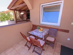 Bild zur gratis inserierten Ferienwohnung Appartement mit Balkon.