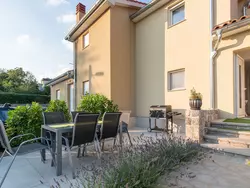 Bild zur gratis inserierten Ferienwohnung mit Garten, Grill und Terrasse.