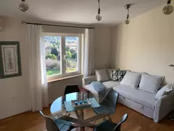 Bild zur gratis inserierten Ferienwohnung Appartement mit Blick auf das Wasser.