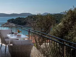 Bild zur gratis inserierten Ferienwohnung Mélanie C im ersten Stock einer Villa am Strand.