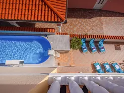 Bild zur gratis inserierten Ferienwohnung Wohnung mit Terrasse und Meerblick.