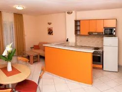 Bild zur gratis inserierten Ferienwohnung Modern eingerichtete Ferienwohnung orange.