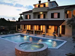 Bild zur gratis inserierten Ferienwohnung Gemütliches Ferienhaus mit Terrasse und Meerblick.