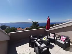 Bild zur gratis inserierten Ferienwohnung Wohnung für 6 Personen mit Terrasse und Meerblick.