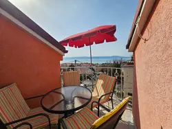 Bild zur gratis inserierten Ferienwohnung Appartement mit Balkon und Meerblick.