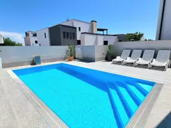 Bild zur gratis inserierten Ferienwohnung Bezaubernde Ferienwohnung mit gemeinsamem Pool.