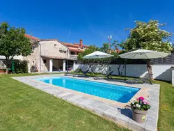 Bild zur gratis inserierten Ferienwohnung Haus Furlani mit schönem Garten und privatem Pool.