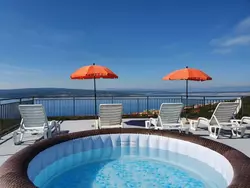 Bild zur gratis inserierten Ferienwohnung Appartement mit Jacuzzi und Meerblick.