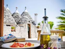 Bild zur gratis inserierten Ferienwohnung Trullo degli Archi, Entspannung und Essen und Wein.