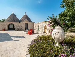 Bild zur gratis inserierten Ferienwohnung Wohnung auf einem Bauernhof mit Trulli und Schwimmbad.