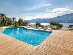 Bild zur gratis inserierten Ferienwohnung Studio mit Seeblick, BBQ und Gemeinschaftspool.