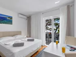 Bild zur gratis inserierten Ferienwohnung Pine Canopy Studio mit Balkon und Meerblick A7.