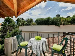 Ferienwohnung Schönes Dachgeschosszimmer mit großem Balkon BV5 in Riva del Garda - 4 Personen, Hund erlaubt